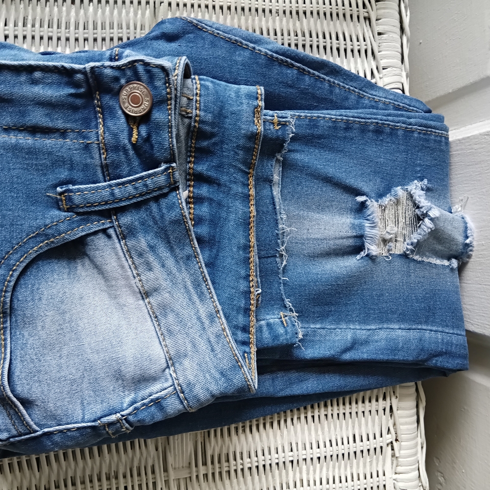 Blue Skinny Distressed Jeans with Faded Wash